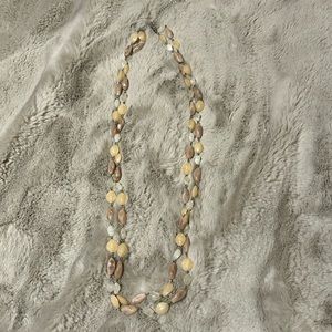Like new Necklace with neutral colored stones.
